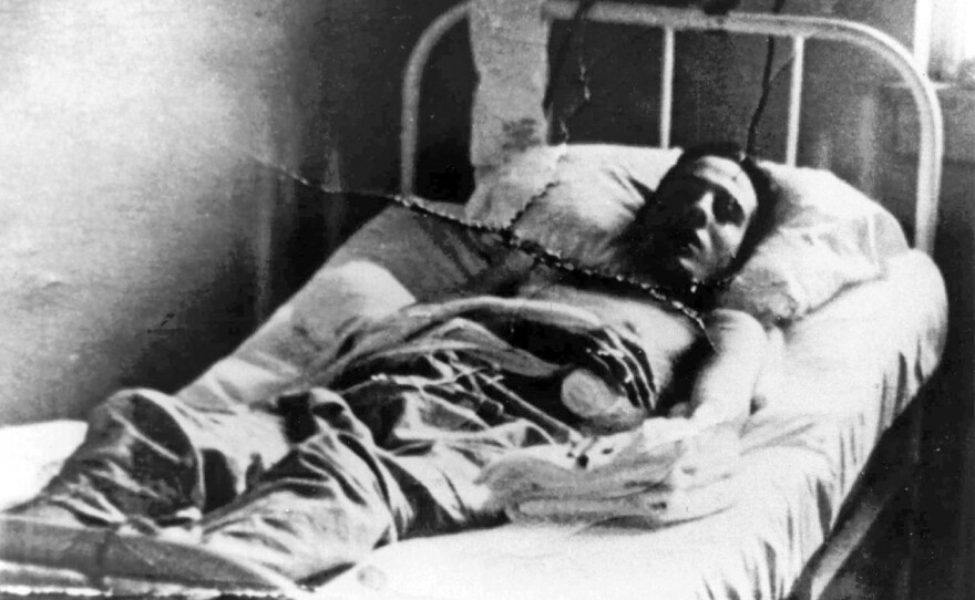 Sen. Bob Dole recuperating from injuries received while serving in Italy during World War II. Dole was critically wounded by shrapnel in April 1945 and spent months recuperating from his injuries at the Percy Jones Army Hospital in Battle Creek, Mich. Dole, leading in the race for the Republican presidential nomination, visited the hospital Thursday, March 14, 1996.