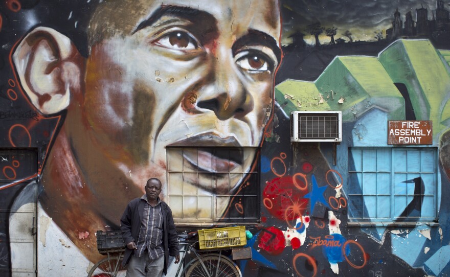 The Kenyan graffiti artist Bankslave brought Obama to Kenya in advance of his visit on July 24. One of the president's agenda items is to promote solar power.