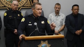 Fresno Police Chief Andrew Hall addresses the media as community leaders and personnel stand behind him about a shooting at a house party which involved multiple fatalities and injuries in Fresno, Calif., Monday, Nov. 18, 2019.