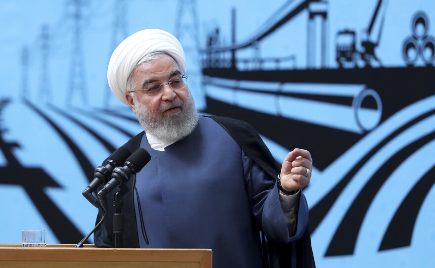 In a photo released by the official website of the office of the Iranian presidency, President Hassan Rouhani speaks at a conference in Tehran on Monday.