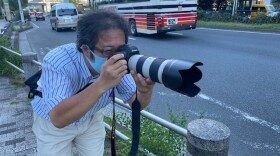 Ryotaro Mori says he's been bus spotting for 30 years, since he was 12 years old. When he's not working as a commercial photographer, he snaps the buses using a camera with a long zoom lens.