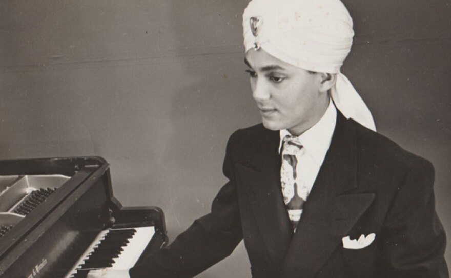 Korla Pandit playing the organ. (undated photo)