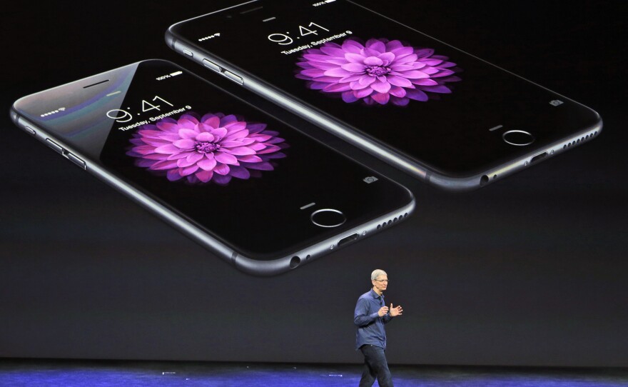 Apple CEO Tim Cook discusses the iPhone 6 and iPhone 6 Plus late last year.