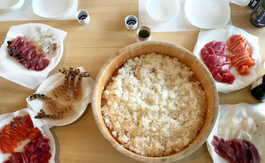 Set up for a hands-on sushi class: wild salmon, wild flounder, prawns, Pacific bluefin tuna, sushi rice and chilled sake.