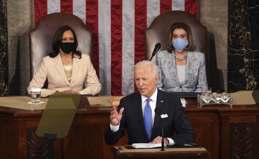 President Joe Biden speaks to a joint session of Congress on Wednesday in the House Chamber at the U.S. Capitol in Washington, as Vice President Kamala Harris and House Speaker Nancy Pelosi watch.