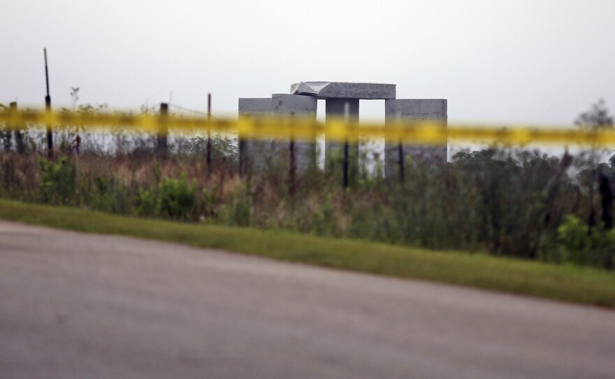 Police tape blocks off the damaged Georgia Guidestones monument near Elberton, Ga., on Wednesday.