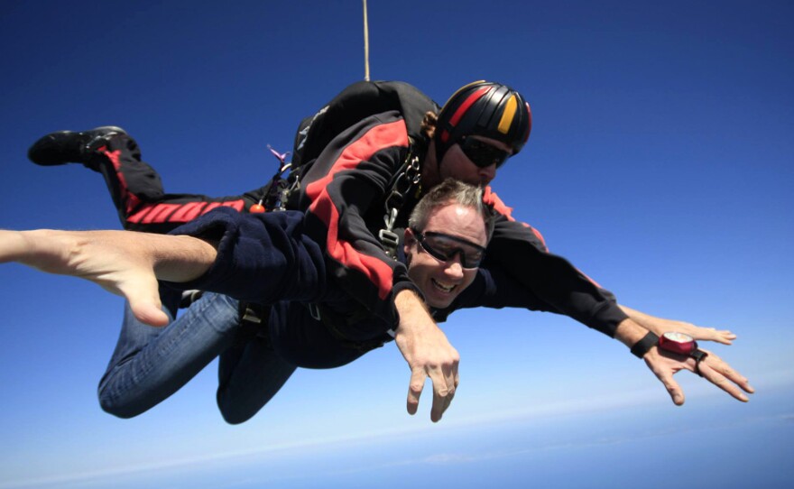 Bret Parker went skydiving in 2013 to raise money for the Michael J. Fox Foundation. Parker participated in a study earlier this year about whether a wearable tracker could effectively measure the severity of tremors caused by Parkinson's.