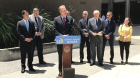 Mayor Kevin Faulconer announces an $8 million grant to fund youth homelessness initiatives in San Diego, July 13, 2018.