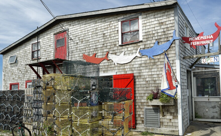 The steel used to build lobster traps like these, stacked up outside a fish market on Martha's Vineyard, is getting pricier, thanks to new tariffs.