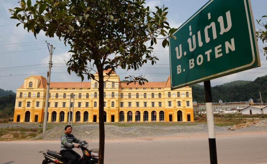 The town of Boten in northern Laos along the Chinese border will be the first stop for high-speed trains outside China. Local government officials hope the train will help boost the local economy by bringing tourists who will stay at hotels like this one, currently under construction.