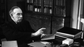 John Maynard Keynes, considered the father of modern macroeconomics, sits at his desk in London in 1940. Economists call the Obama administration's stimulus package the first real test of Keynesian economics, but long-term benefits of Keynes' theory are still up for debate.