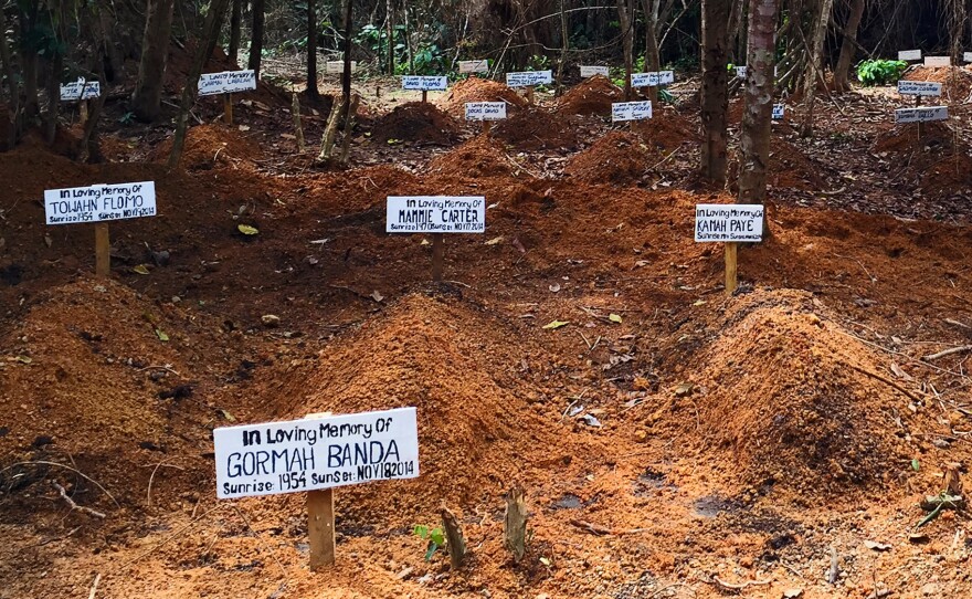 Each day, a nurse comes to this clearing outside Taylortown, Liberia, to sing a song of mourning, preparing the space for the next burial. So far nearly 100 people are interred here.