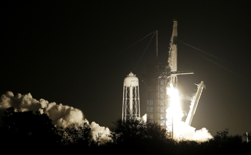 A SpaceX Falcon 9 rocket and Crew Dragon capsule lifts off from pad 39A on Saturday in Cape Canaveral, Fla.