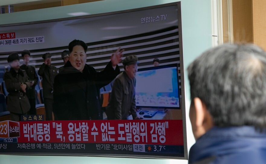 People watch a television screen showing news of North Korea's long-range rocket launch on Feb. 7 in Seoul. The new proposed U.N. resolution would ban supplying North Korea with aviation fuel, including rocket fuel.