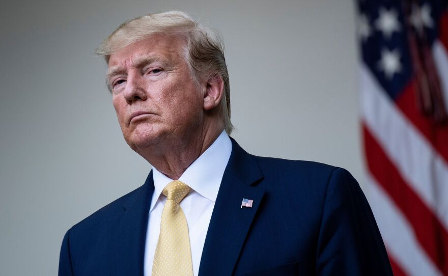 President Trump pauses after delivering remarks on citizenship and the census in the Rose Garden at the White House on Thursday.