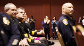 San Diegans protested police brutality while members of the police force watched the San Diego City Council inauguration ceremony at Golden Hall, Dec. 10, 2014. 