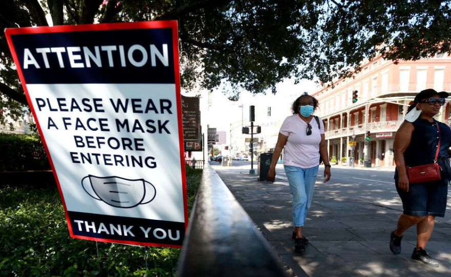 Scientists estimate that near-universal mask use could make a major difference in bringing down coronavirus infections in the United States.