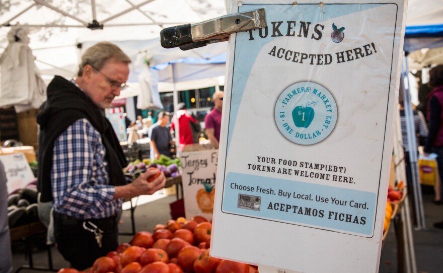 This shop in the GrowNYC Greenmarket in New York's Union Square accepts Electronic Benefits Transfer (EBT), or food stamp benefits.
