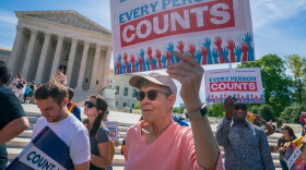 Demonstrators holding signs saying "EVERY PERSON COUNTS" rally outside the Supreme Court in 2019 in Washington, D.C., as the justices hear arguments over the first Trump administration's failed push to ask about U.S. citizenship status on the 2020 census.
