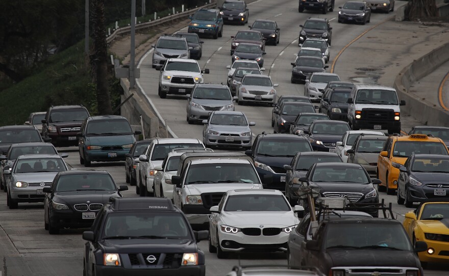 Cars on Highway 101 in Los Angeles on Tuesday. Around the nation, Americans drove a record number of miles last year.