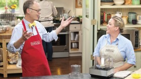 Host Cristopher Kimball and test cook Julia Collin Davison in the kitchen.