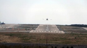 A plane landing at McClellan-Palomar Airport in Carlsbad on July 31, 2024.