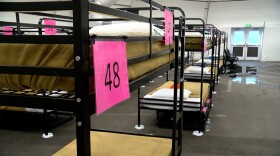 Bunk beds line the inside of the 150 bed Midway District shelter that is a partnership between the city of San Diego and San Diego County.