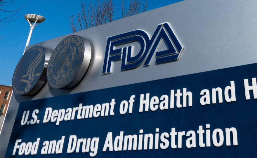 FILE - A sign for the U.S. Food and Drug Administration is displayed outside their offices in Silver Spring, Md., Dec. 10, 2020. (AP Photo/Manuel Balce Ceneta, File)