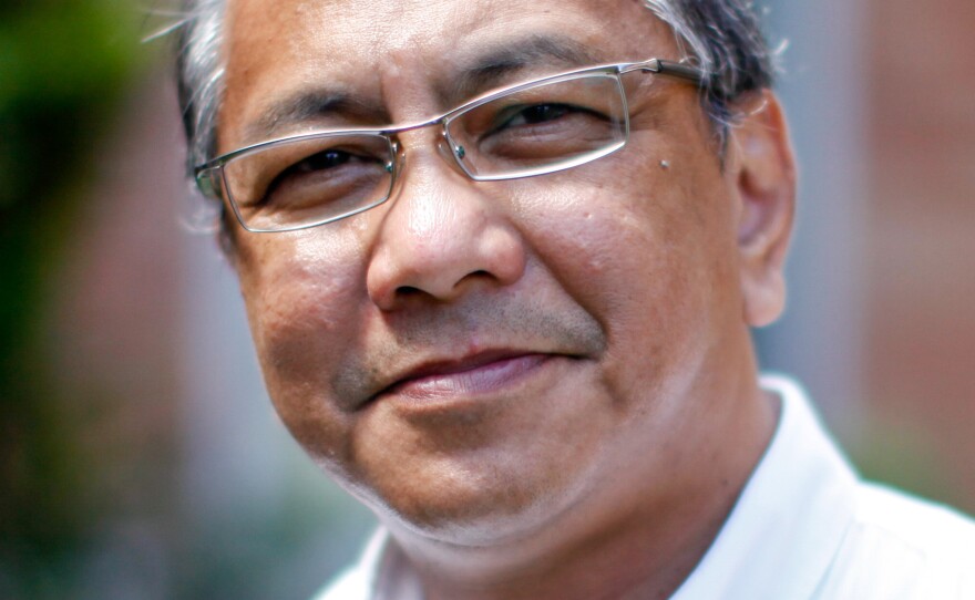Ed Garcia, general director of Firestone's rubber plantation, oversees 8,500 employees, 185 square miles of rubber trees, 27 schools, 450 teachers, a hospital — and now, an Ebola clinic.