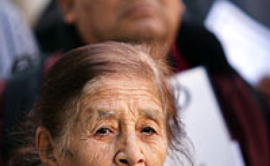 Hispanic activists protest against immigration raids across the country at a rally in Los Angeles in December.