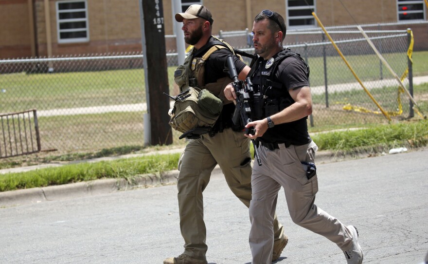Police respond to a shooting at Robb Elementary School in Uvalde, Texas, on Tuesday.