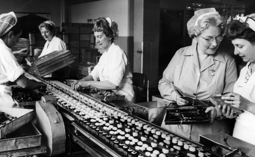 It was Cadbury that first linked Valentine's Day with those heart-shaped boxes filled with chocolates nestled in lace doilies. Here, women work on a production line at Cadbury's in England in 1966.