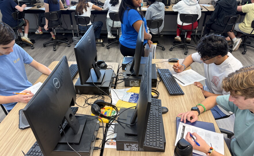 Teacher Gerri Kimble monitors her AP Business with Personal Finance class as they work on an assignment about the outside factors that affect people's and businesses' bottom line at Hoover High School on October 6, 2026.