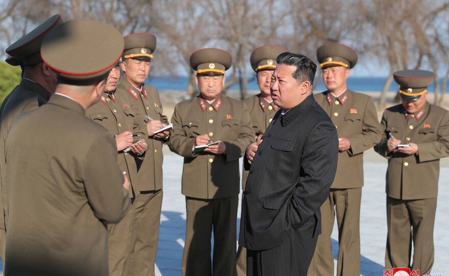 This undated handout picture released from North Korea's official Korean Central News Agency in April 2022 shows North Korean leader Kim Jong Un as he observes the test-fire of a new-type tactical guided weapon in North Korea.