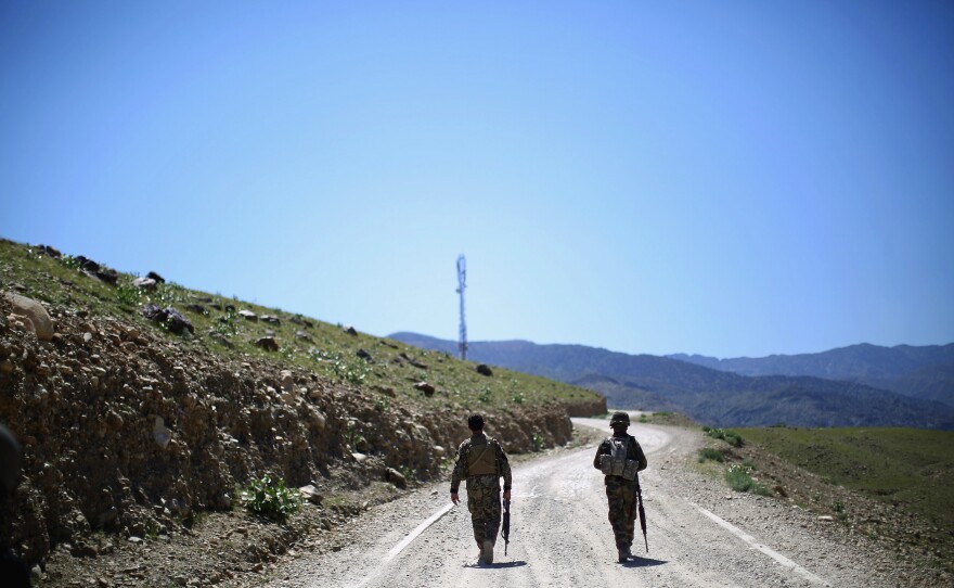 Afghan Army soldiers head up a road in Nangahar Province, where Taliban fighters are attacking a police checkpoint that is under construction. The Afghan military is much more active in the fight compared to a couple years ago, when troops hung back on patrols and let the Americans lead.