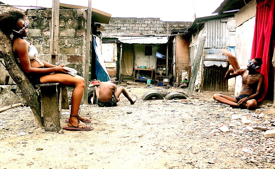 A scene from the first science-fiction film being made in Kinshasha, capital of the Democratic Republic of the Congo. The movie takes place in the year 3010, a time of terrible heat, health crises and deep poverty. The actors are wearing what's described as "protective eyewear."