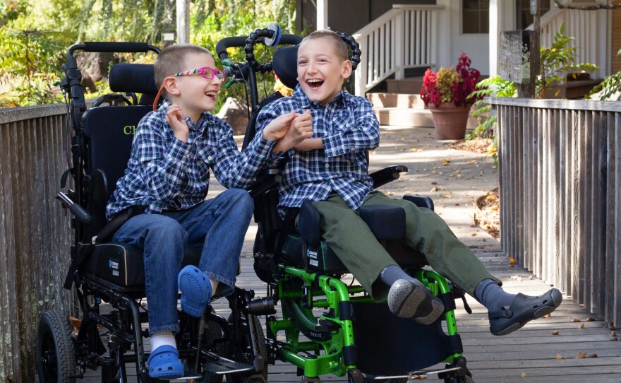 Brothers Chase (left), 10, and Carson, 11, in November 2021. The two brothers have a rare genetic disorder and they are immunocompromised. Their family has to practice extreme caution to prevent COVID exposures.