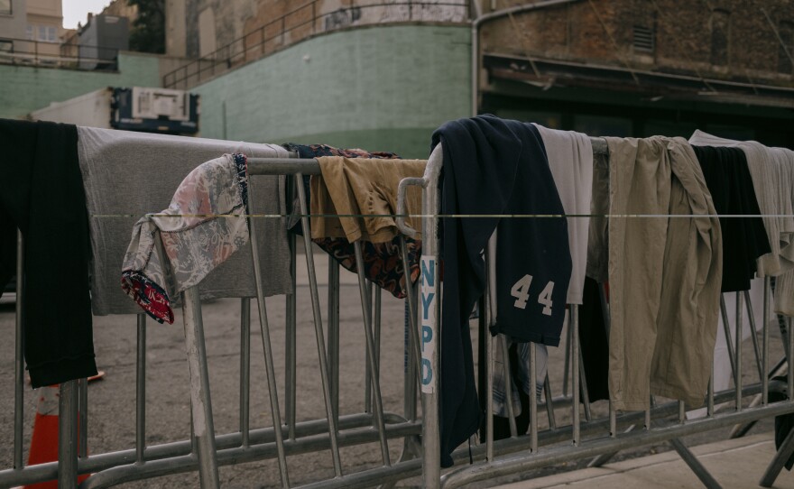 Clothing — washed inside the Brooklyn facility's two shower units — hangs to dry.