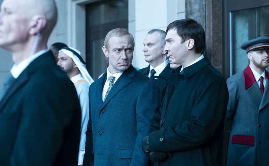 Jude Law, left, plays Russian President Vladimir Putin and Paul Dano plays his media advisor in The Wizard of the Kremlin.