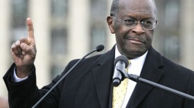 <p>Republican presidential candidate Herman Cain speaks on Friday while unveiling his "Opportunity Zone" economic plan in front of the Michigan Central Station, an abandoned train depot in Detroit.</p>