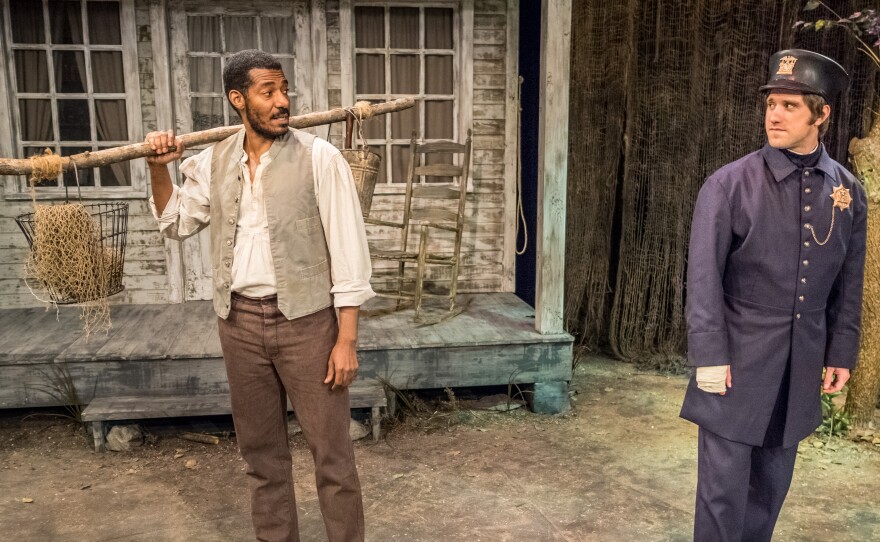 Stephen Van Cleef, a fictional Seneca Village resident played by Billy Eugene Jones (left), meets a New York City police officer, played by Andy Truschinski, in The People Before the Park at Premiere Stages at Kean University in Union, N.J.