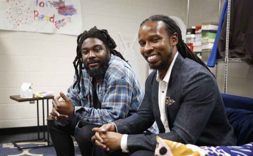 Authors Jason Reynolds, left, and Ibram X. Kendi spoke to students at a high school in Washington D.C. about their new book, <em>Stamped: Racism, Antiracism and You.</em>
