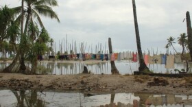 The village of Tebunginako, on one of Kiribati's remote outer islands, Abaiang. Residents were forced to relocate after the sea inundated the village.