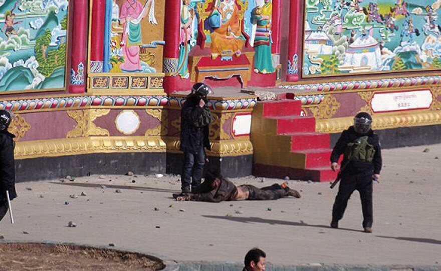 This photo, provided to <a href="http://freetibet.org/">freetibet.org</a>, shows a man being forcibly detained by security forces in the town of Serther in Tibet following a clash with protesters and police.
