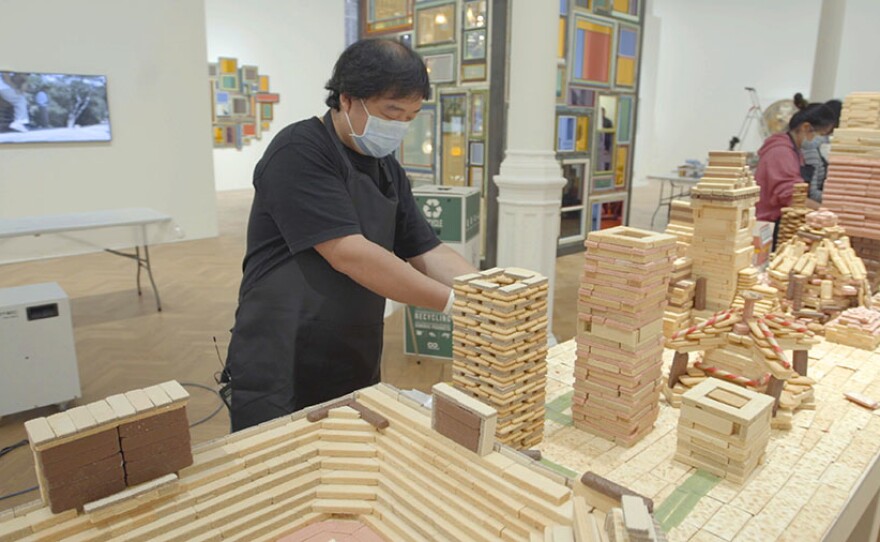 Song Dong installing "Eating the City" (2019) at Pace Gallery, London. Production still from the Art21 television series ART IN THE TWENTY-FIRST CENTURY Season 10, 2020.