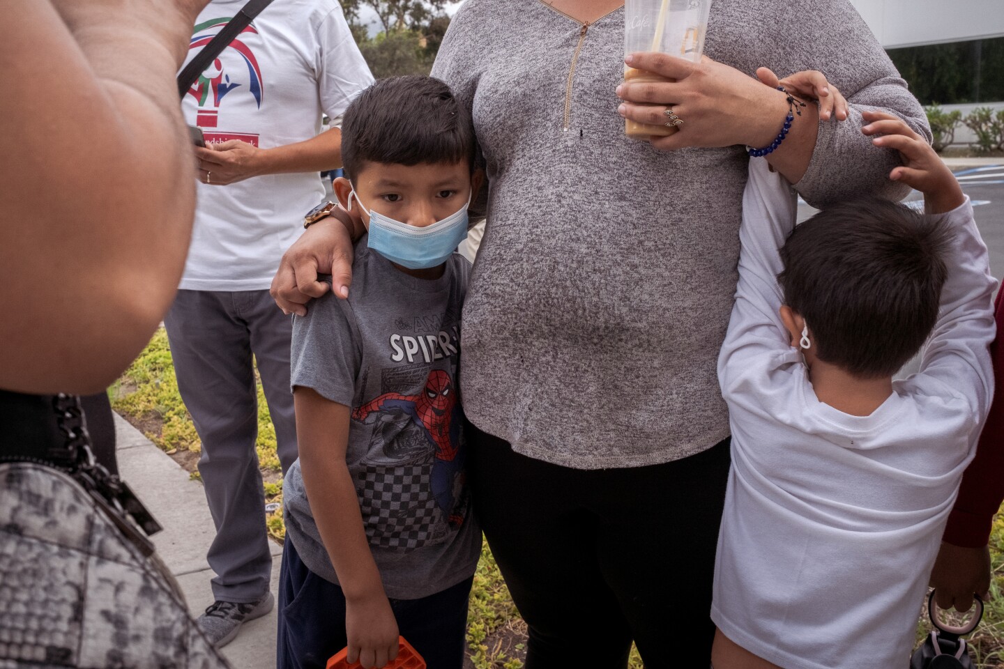 Two of Azucena Lopez's children (pictured two of the three) haven't seen their grandparents in over a year. Lopez says that reopening Friendship Park would allow them to see their family without fear of being deported. Chula Vista Border Patrol Station in Chula Vista, Calif. Oct. 7, 2021.