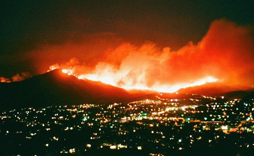 The Harris Fire burns down Mount Miguel in San Diego County on Oct. 23, 2007. 