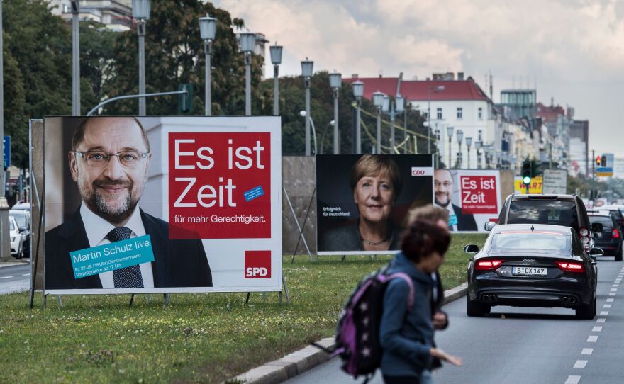 Billboards featuring German Chancellor Angela Merkel (center) and Martin Schulz (left), leader of Germany's Social Democratic Party and candidate for chancellor, are pictured in Berlin on Sept. 17.