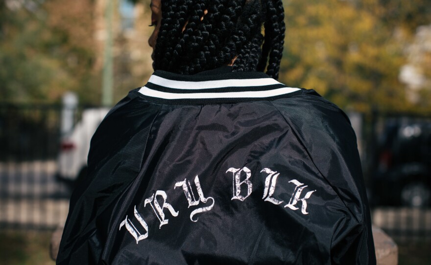 "Afrofuturism's not just about imagining people in the future but also reimagining black history," Woods says.