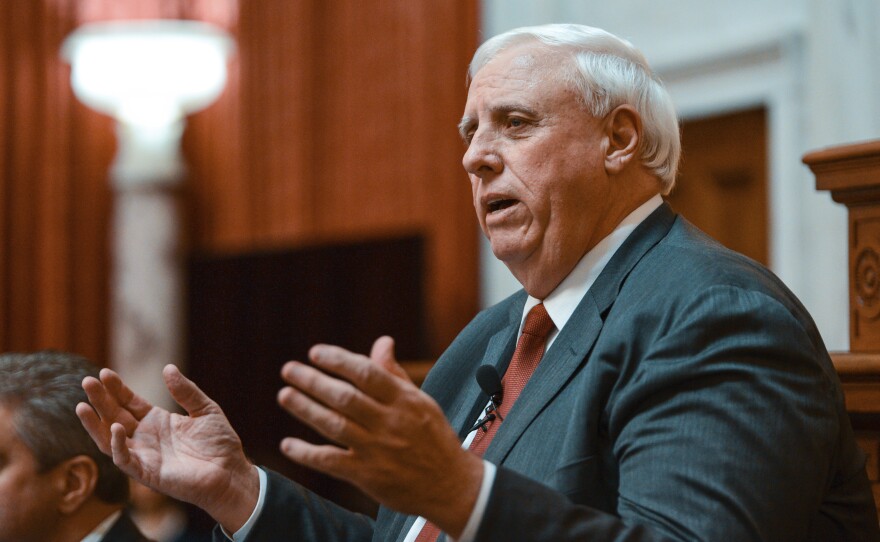 West Virginia Gov. Jim Justice delivers his State of the State speech on Jan. 9 in Charleston, W.Va. Mining companies belonging to the Justice family owe millions in safety violations.